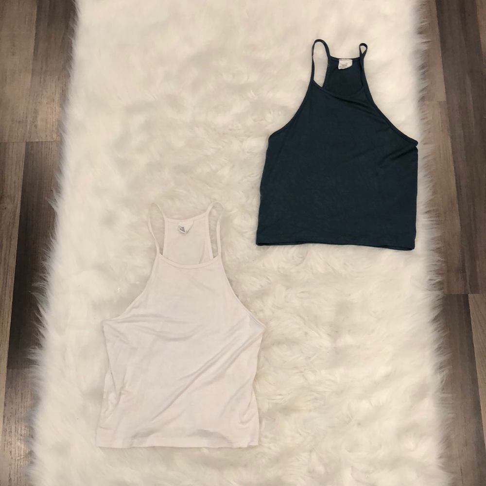 Two High Neck Tanks